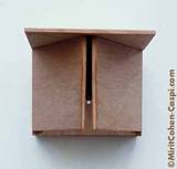 1989, plywood, and aluminum 29x29X40 cm.