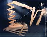 1988, unpainted white wood, aluminum pipes, threaded rods and dome nuts.